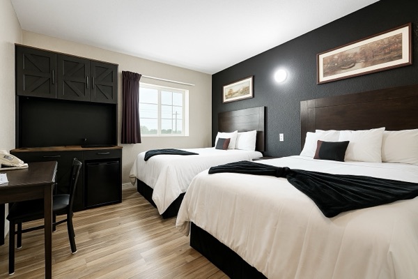 Double room with desk and framed panorama art