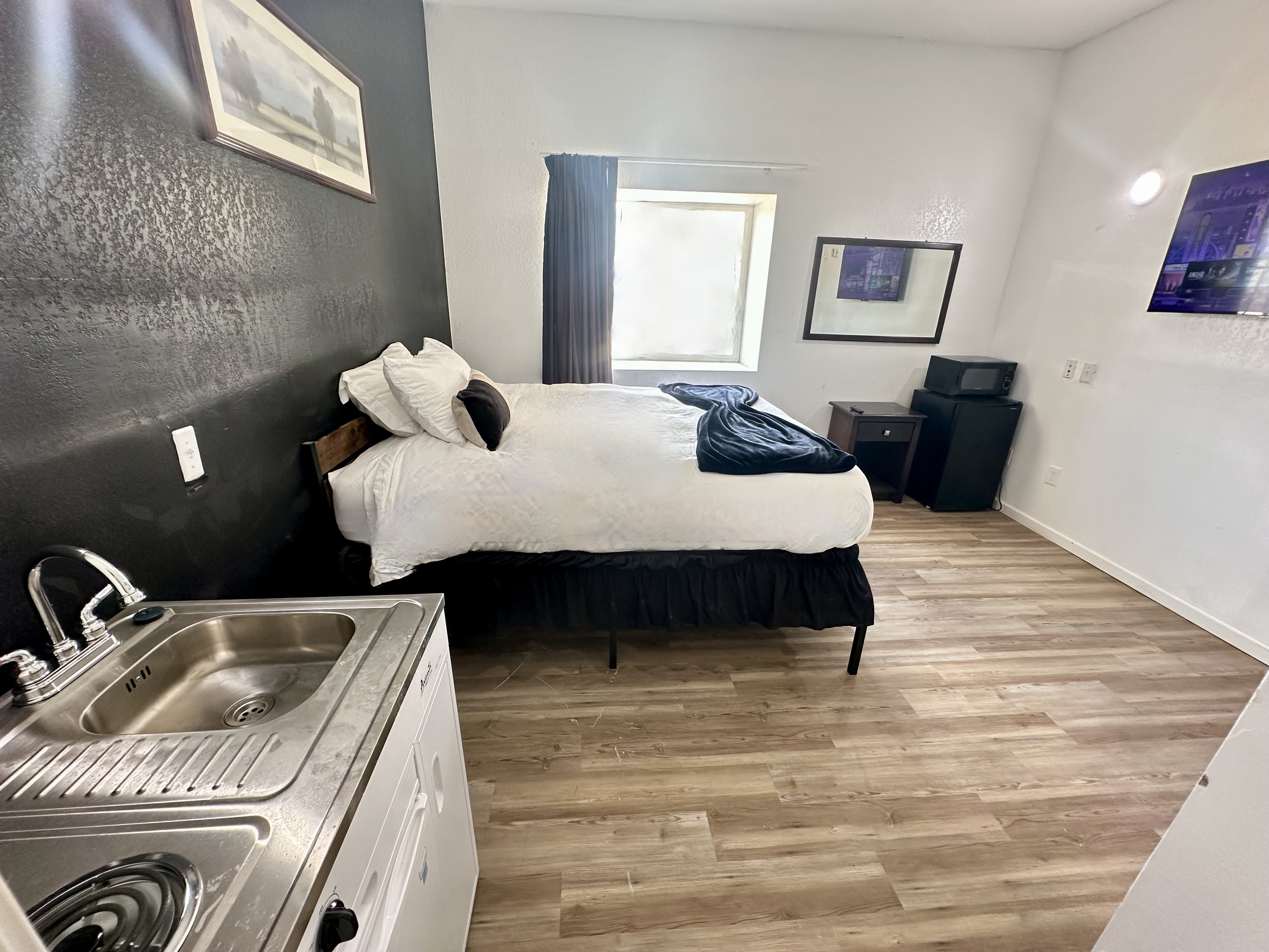 Move-in ready furnished studio-style room at Hotel Dilley