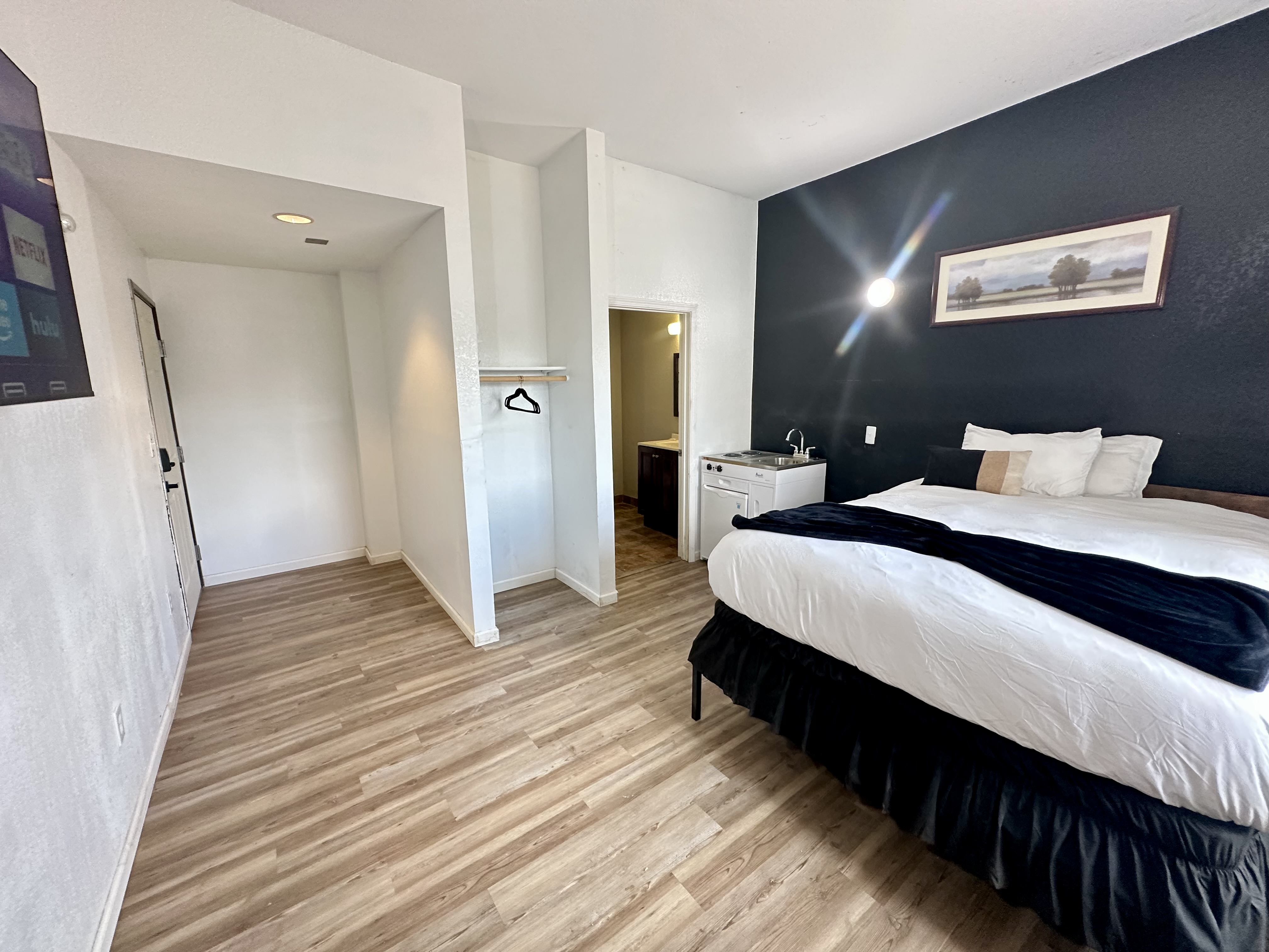 Furnished room kitchenette area at Hotel Dilley